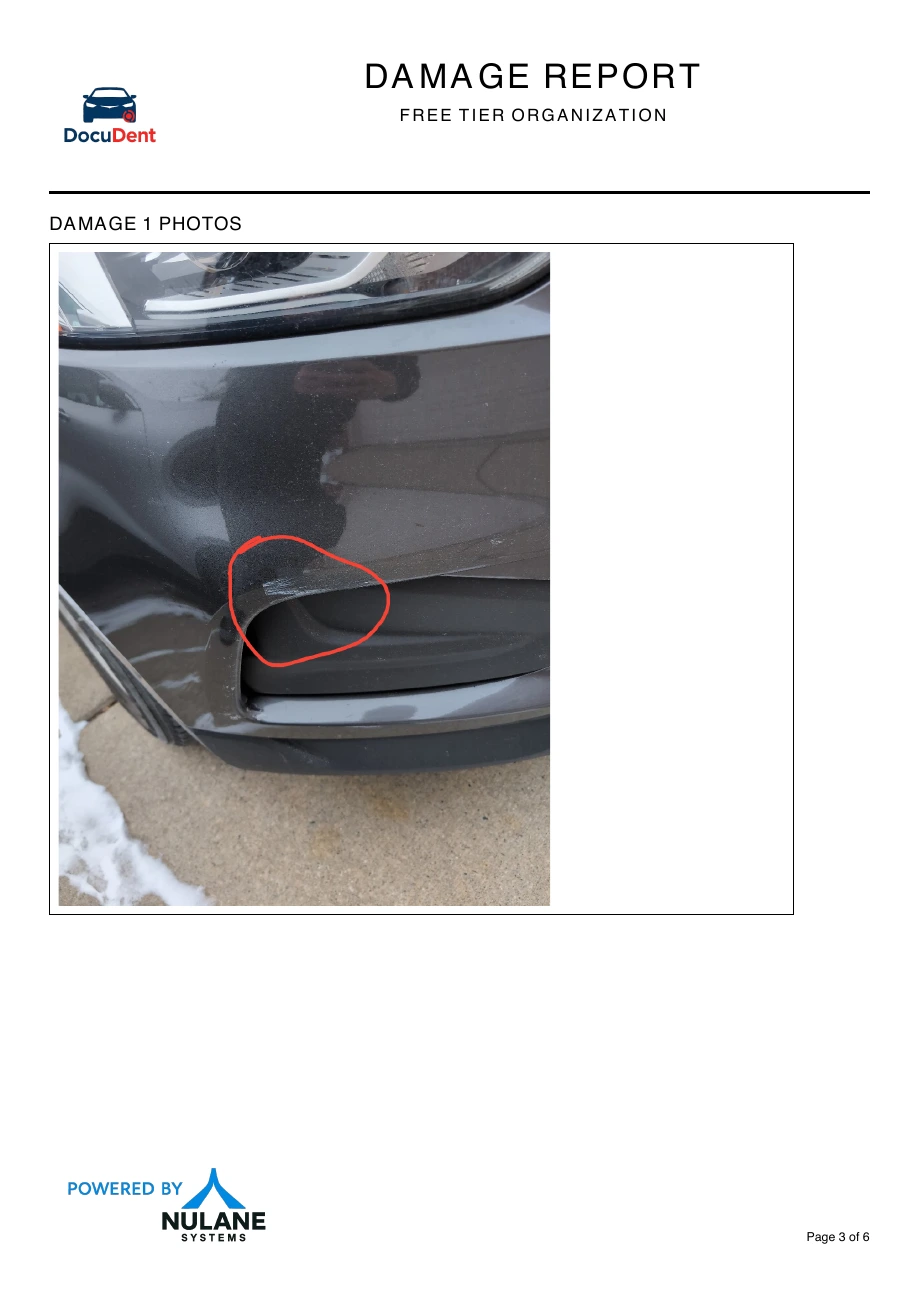Sample report page 3: Front bumper damage photograph with the scratch marked.